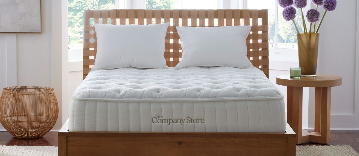 Hybrid mattress on modern bed frame