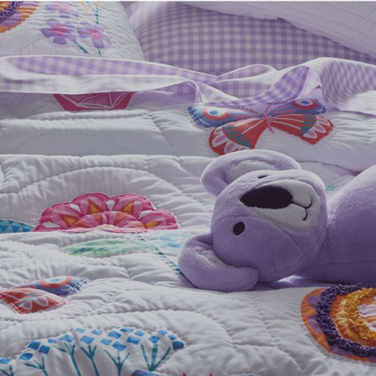 Layering a Comfy Kid’s Bed 