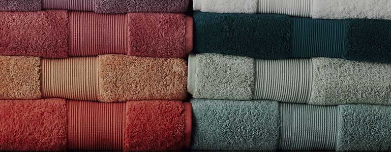 How to Fold or Roll Bath Towels for Storage