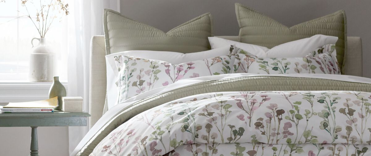 Bed with Floral Duvet Cover