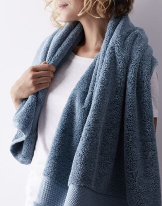 woman with blue towel