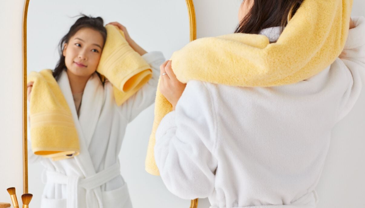 Woman looking in mirror