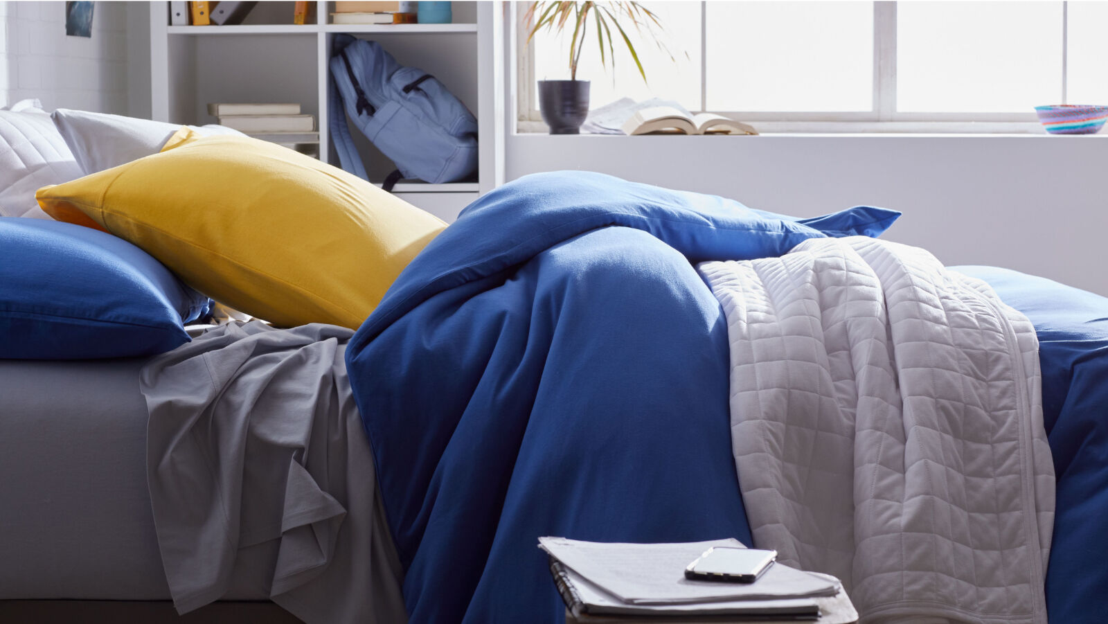 Jersey knit sheets and blue duvet cover
